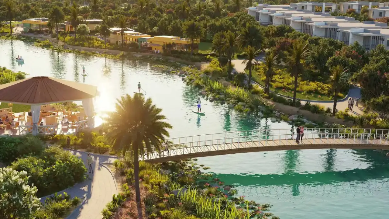 Violet at DAMAC Hills 2 by DAMAC Properties lagoon waterfront with pedestrian bridge landscaped parks and leisure spaces in Dubai Presented by Tohid Fetrat