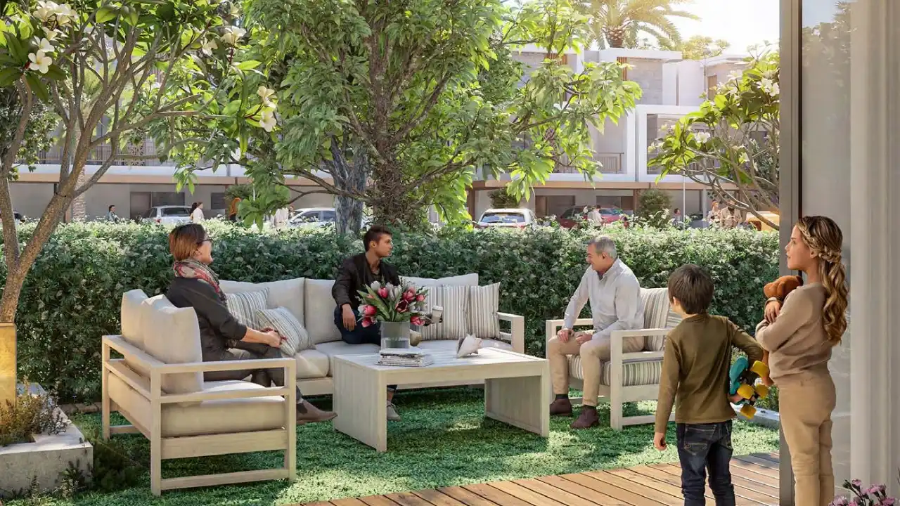 Violet at DAMAC Hills 2 by DAMAC Properties townhouse garden terrace with outdoor seating surrounded by landscaped greenery in Dubai Presented by Tohid Fetrat