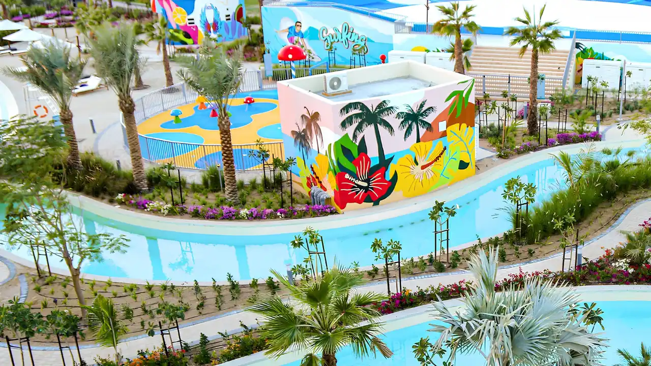 Violet at DAMAC Hills 2 by DAMAC Properties water play area with landscaped lagoon and family recreation facilities in Dubai Presented by Tohid Fetrat
